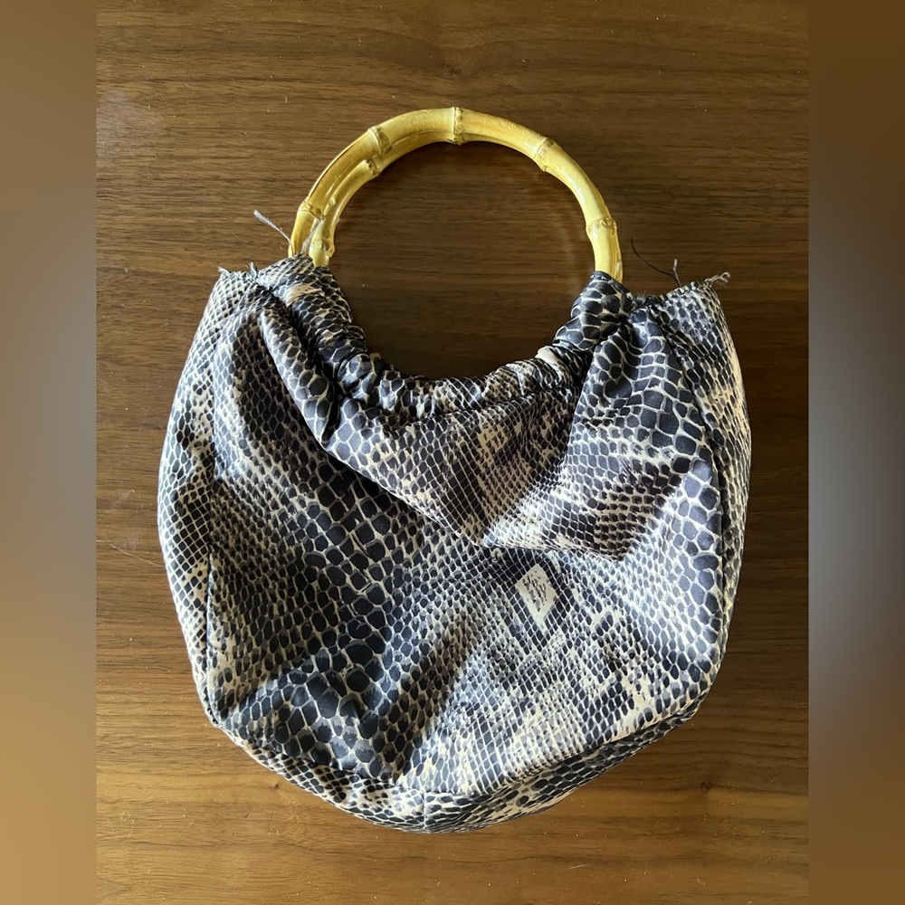 Snake print bucket bag